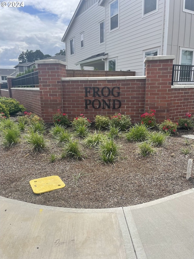 view of community sign