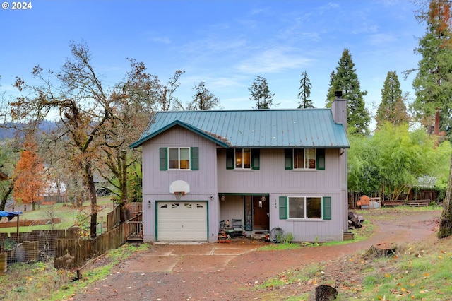 view of front of property featuring a garage