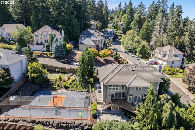 birds eye view of property with a residential view