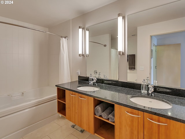 bathroom featuring tile patterned floors, shower / bath combo, and vanity