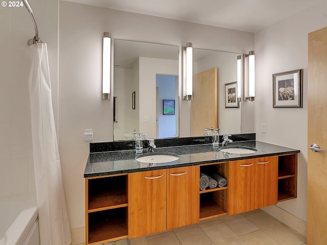 bathroom with tile patterned flooring, vanity, and shower / bath combination with curtain