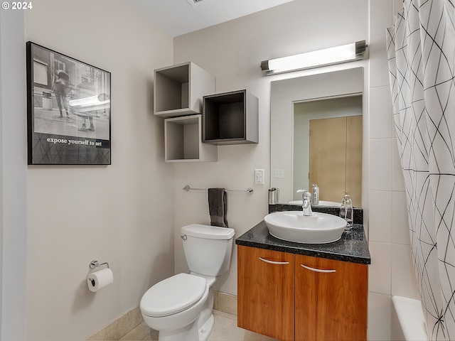 full bathroom with tile patterned flooring, vanity, shower / bath combination with curtain, and toilet