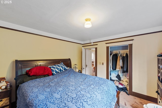 bedroom with carpet flooring and a closet