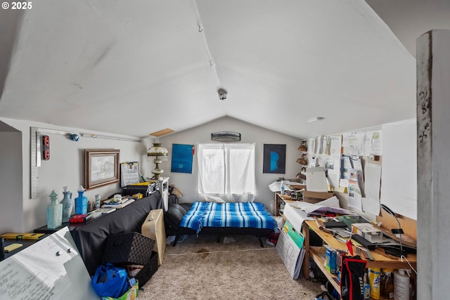 carpeted bedroom featuring lofted ceiling