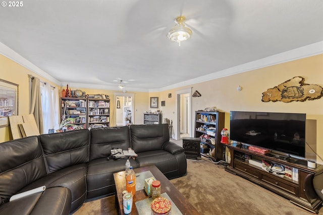 living room featuring ceiling fan, carpet flooring, and crown molding