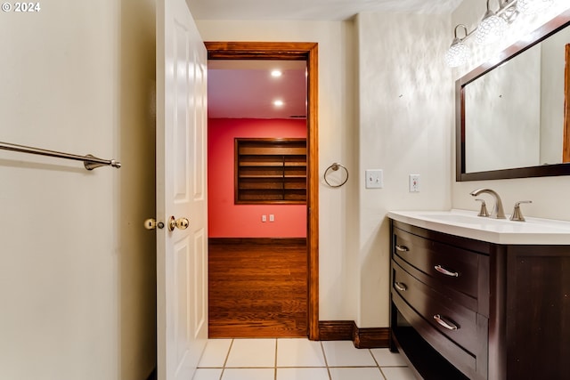 bathroom with tile patterned floors and vanity