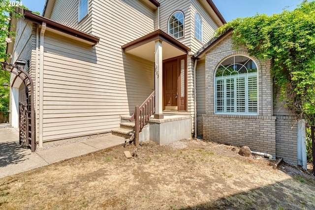 entrance to property featuring a garage