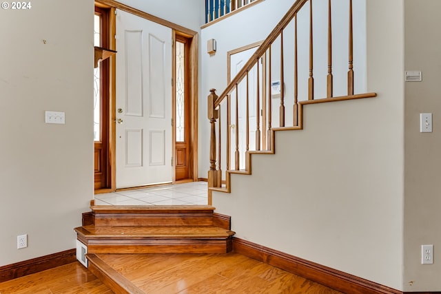 entryway with light hardwood / wood-style floors