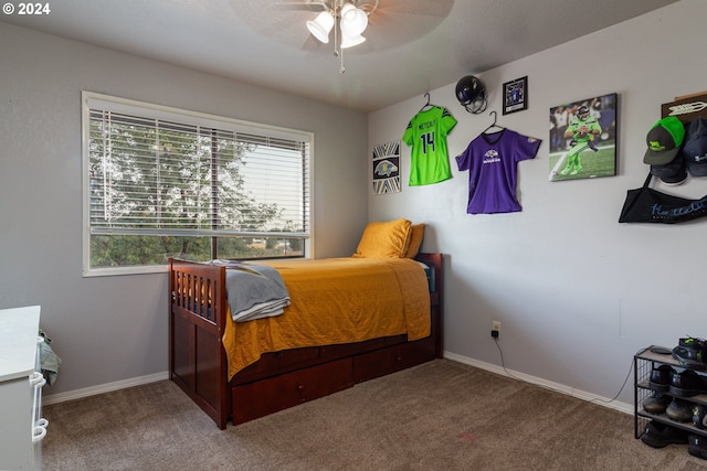 carpeted bedroom featuring ceiling fan