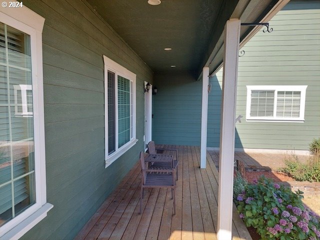 wooden deck featuring covered porch