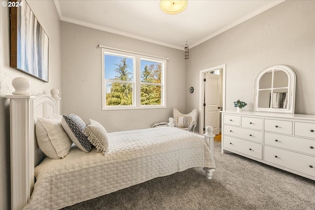 bedroom with crown molding and carpet flooring