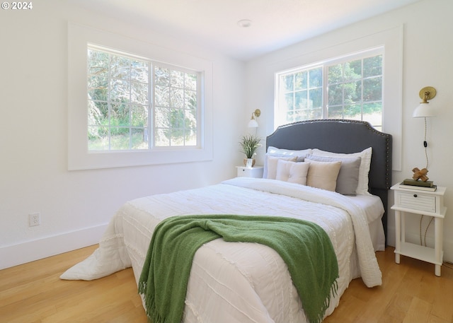 bedroom featuring hardwood / wood-style flooring