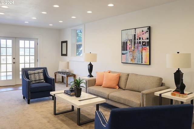 living room featuring french doors and light carpet