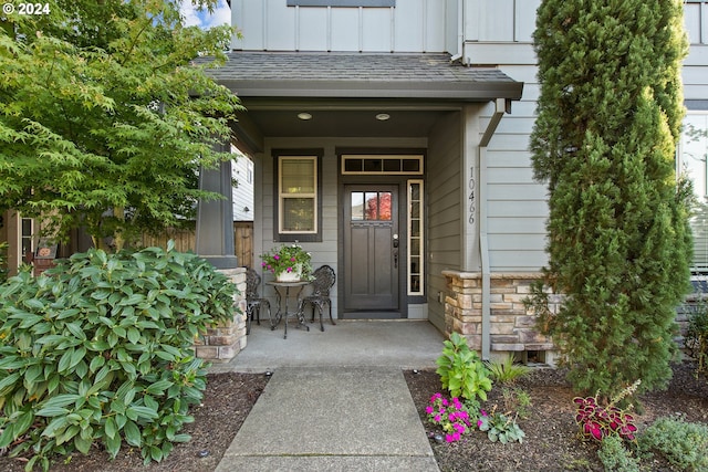 property entrance featuring covered porch