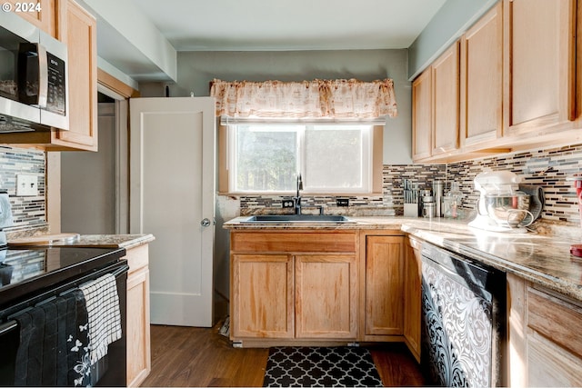 kitchen featuring decorative backsplash, light brown cabinets, dark hardwood / wood-style floors, sink, and black appliances