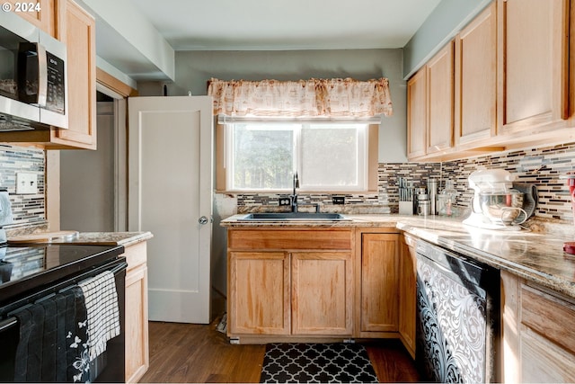 4310 NE 33rd Ave, Portland, OR 97211 - kitchen with stainless steel microwave, electric range, a sink, dishwasher, and tasteful backsplash