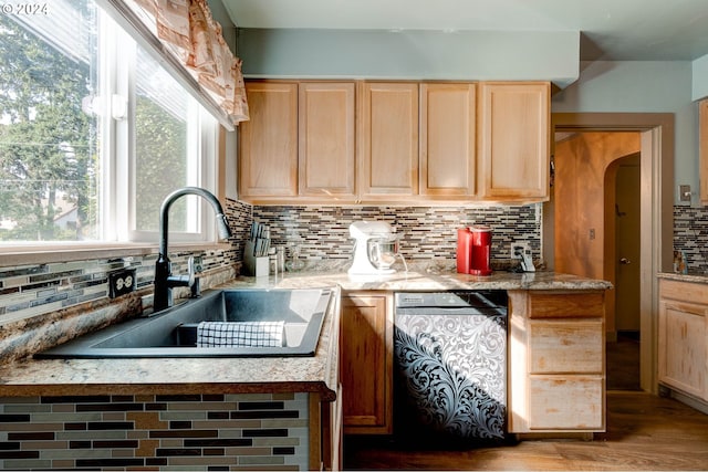 4310 NE 33rd Ave, Portland, OR 97211 - kitchen featuring light brown cabinetry, a sink, tasteful backsplash, wood finished floors, and light countertops