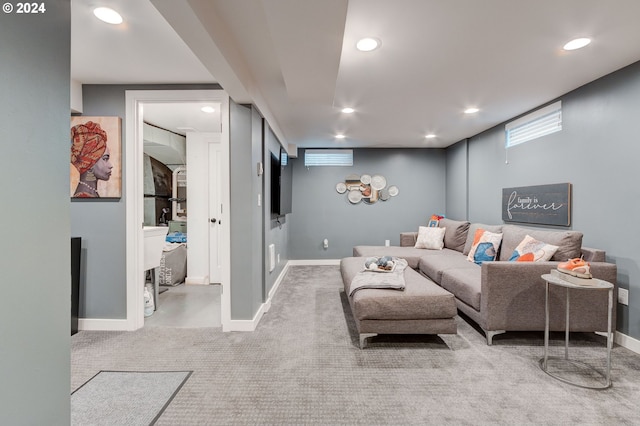 living room featuring light carpet