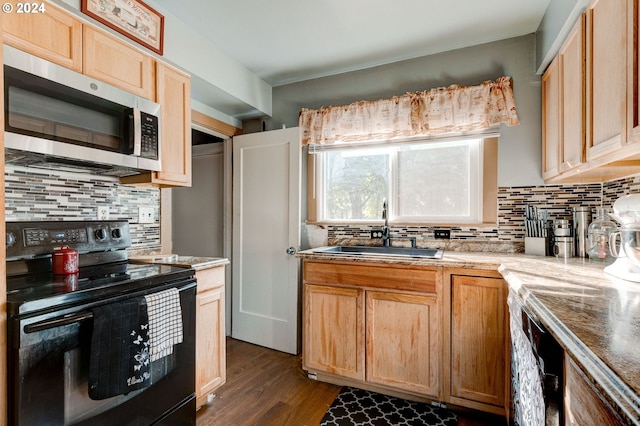 kitchen featuring black electric range oven, decorative backsplash, sink, and dark wood-type flooring