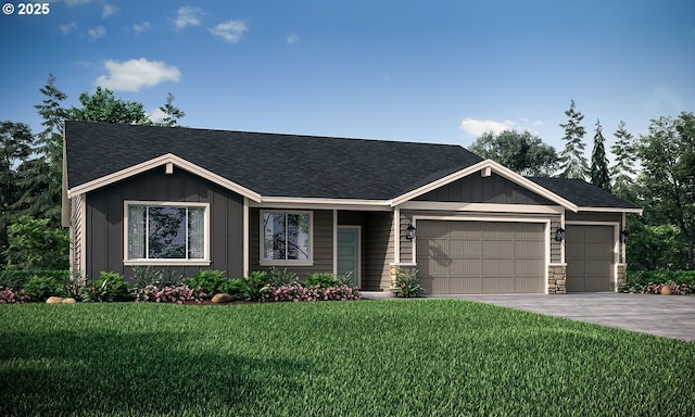 view of front of property with a front yard and a garage