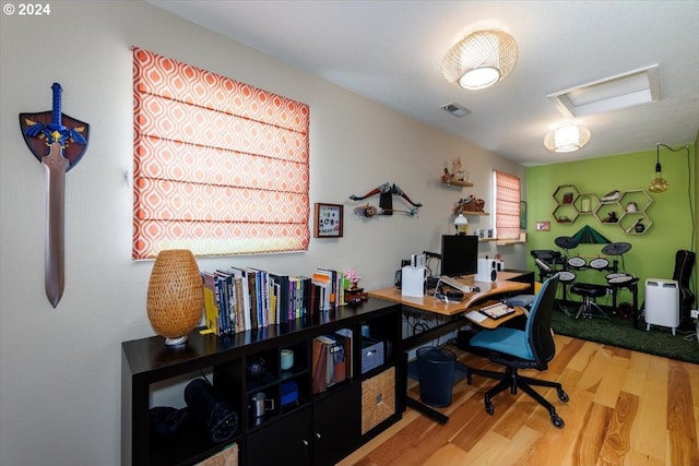 office space with hardwood / wood-style flooring