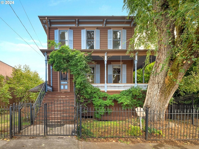 italianate home with covered porch