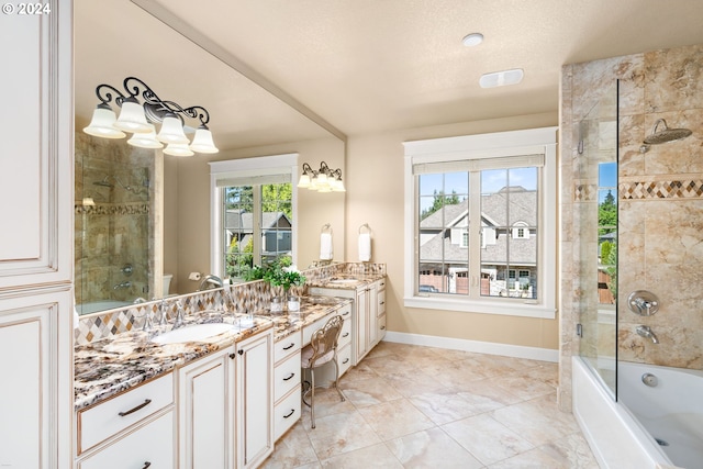 full bathroom featuring shower / bath combination with glass door, vanity, and toilet