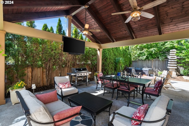 view of patio with grilling area, ceiling fan, and an outdoor hangout area