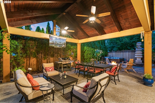 view of patio / terrace featuring a gazebo, grilling area, ceiling fan, and an outdoor living space with a fire pit