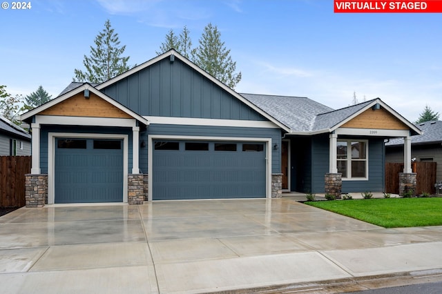 craftsman-style home featuring a garage