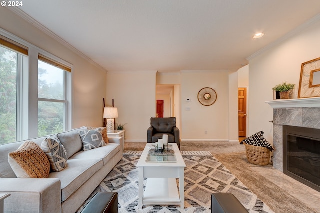 living room with ornamental molding, light colored carpet, and a tile fireplace