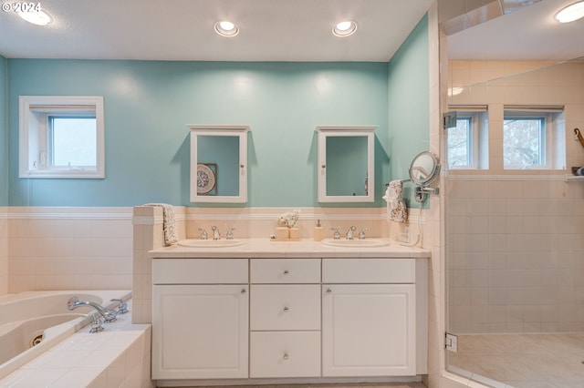 bathroom with vanity, shower with separate bathtub, and tile patterned floors