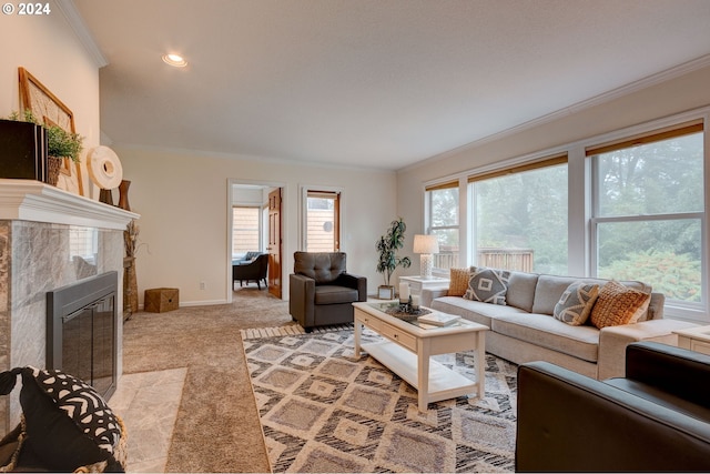 carpeted living room featuring a premium fireplace and ornamental molding