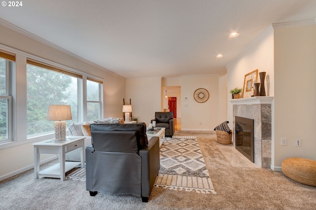 living room with crown molding, light colored carpet, and a fireplace