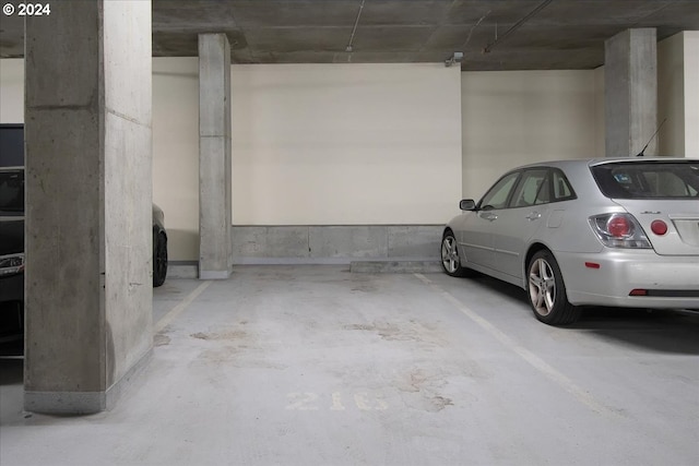 garage featuring a carport