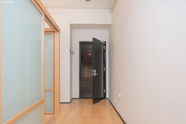 hallway featuring light hardwood / wood-style floors