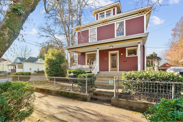 italianate home featuring a porch