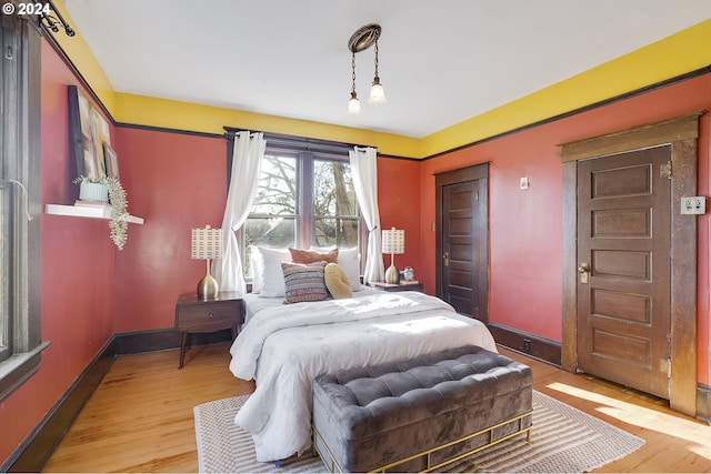 bedroom with wood-type flooring