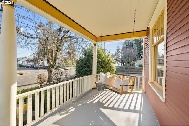 balcony featuring covered porch