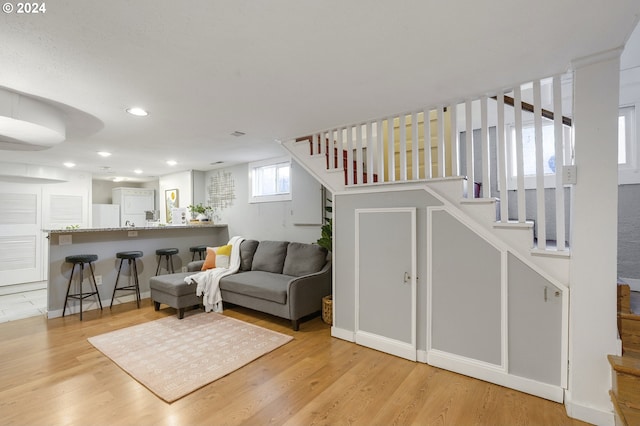 living room featuring light wood-type flooring