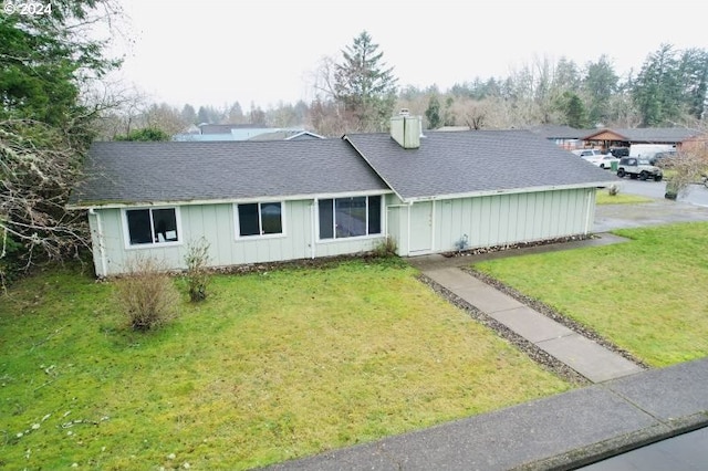 view of front of home with a front yard