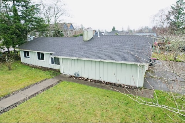 view of home's exterior featuring a lawn