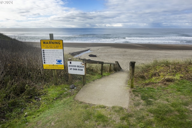 view of water feature featuring a beach view