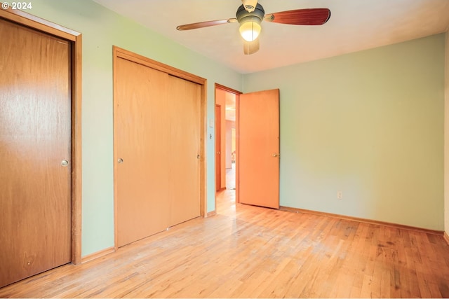 unfurnished bedroom featuring light hardwood / wood-style flooring and ceiling fan