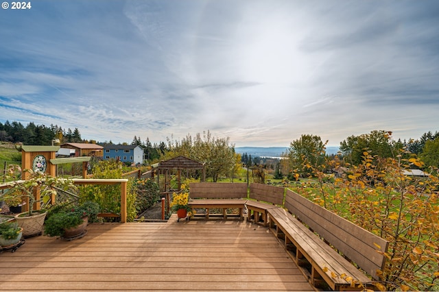 wooden deck featuring a gazebo