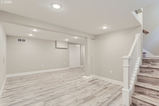 basement with light wood-type flooring