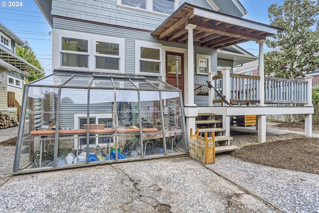 doorway to property featuring a deck