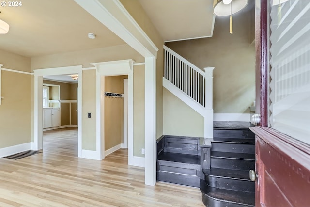 staircase featuring hardwood / wood-style floors