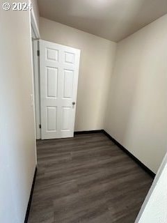 empty room featuring dark hardwood / wood-style floors