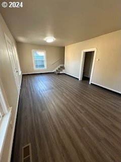 interior space with dark wood-type flooring